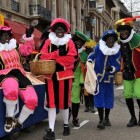 Originele en huidige versie van Sinterklaas en Zwarte Piet