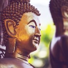 Wat is het onderscheid tussen Boeddha en Budai